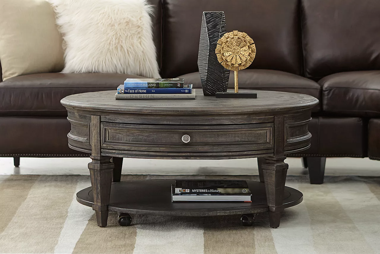 The Beckley round coffee table in room scene.